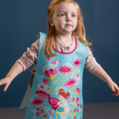Girl Wearing Trixie The Pixie Tabard for Children's Gardening