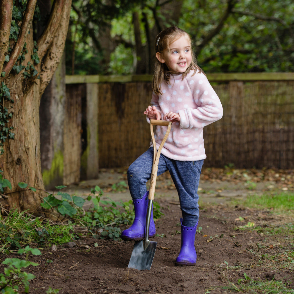 Child digging using the Kent and Stowe kids digging spade