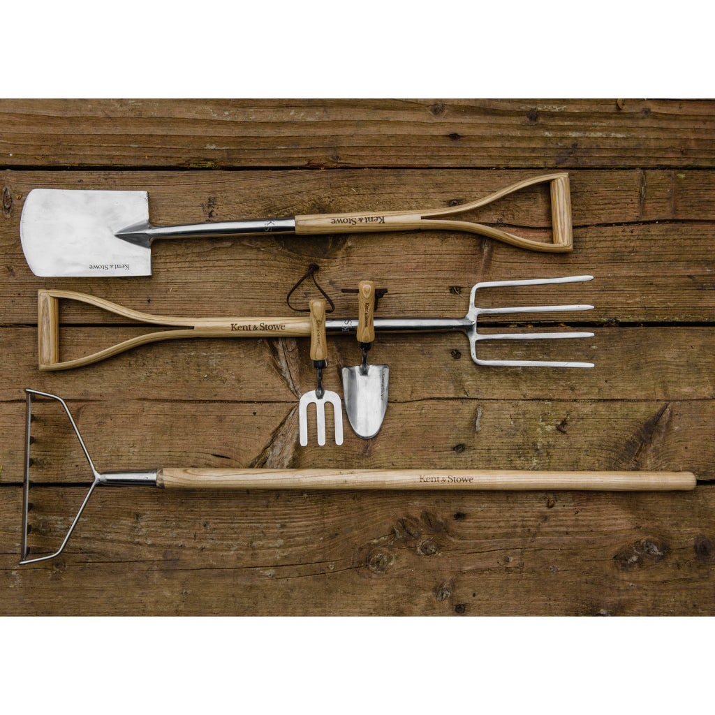 Whole range of children gardening tools from Kent and Stowe including digging fork and spade, hand trowel and fork and rake