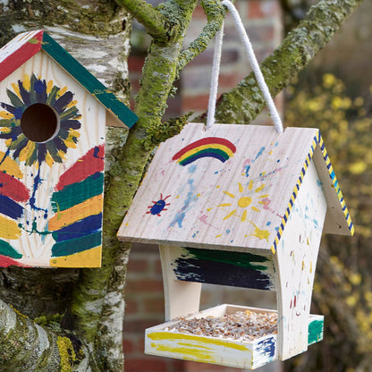 Paint your own bird feeder for children attached to a tree